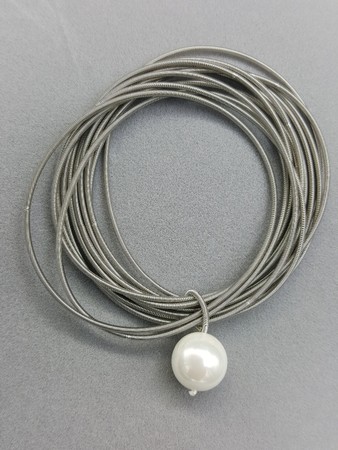 Single Pearl Silver Piano Wire Bracelet